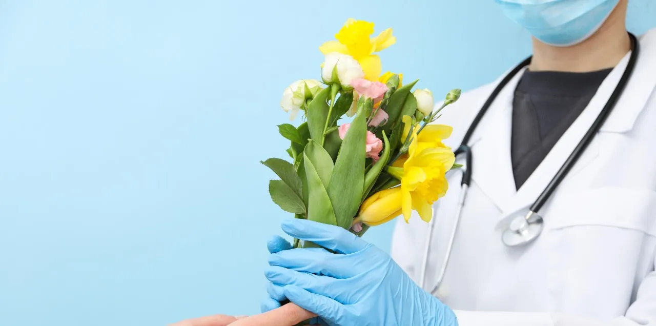 nurse receiving flowers